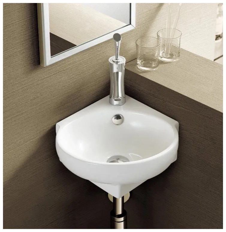 Lavabo suspendido blanco ovalado de cerámica con rebosadero para esquina Mini 39 de Aquore