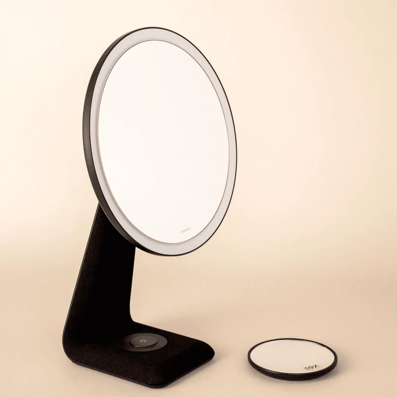 Espejo con aumento y luz Essentials
