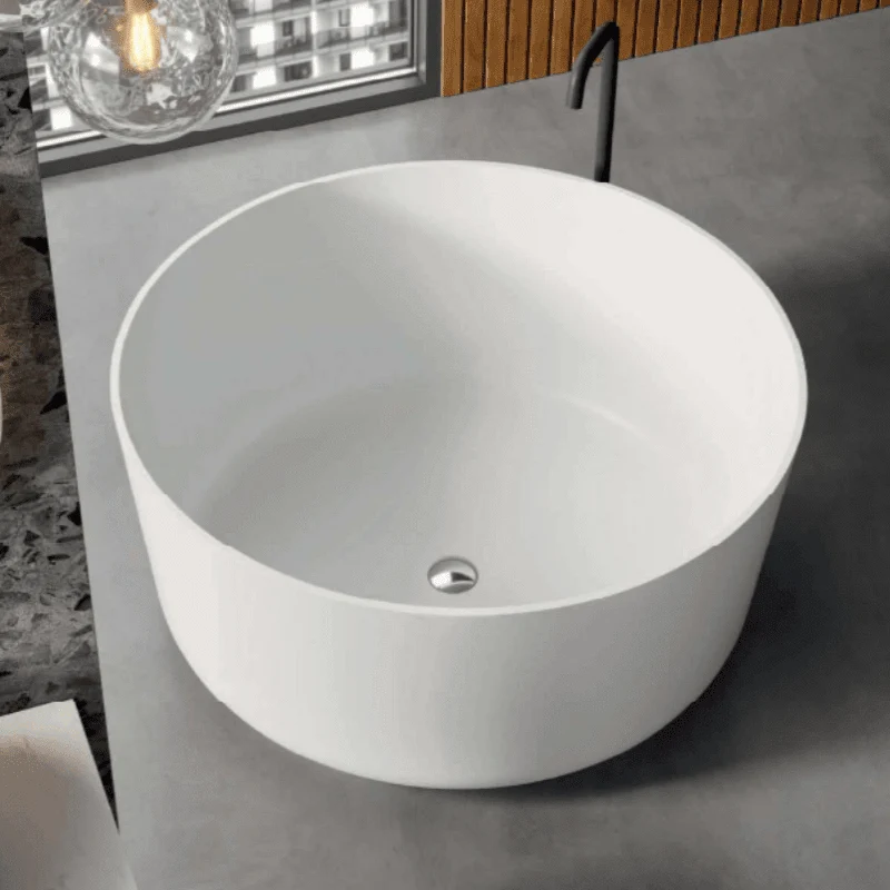 Bañera exenta redonda Solid Surface moderna SERAVA