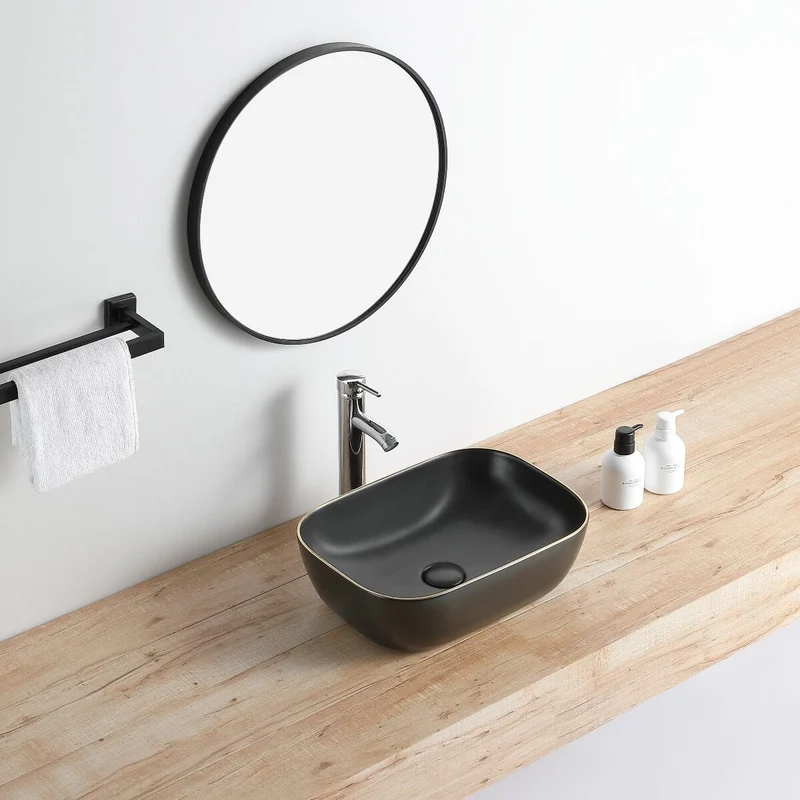 Lavabo negro mate borde dorado sobre encimera cerámico CUARTO 45,5 x 32,5 cm
