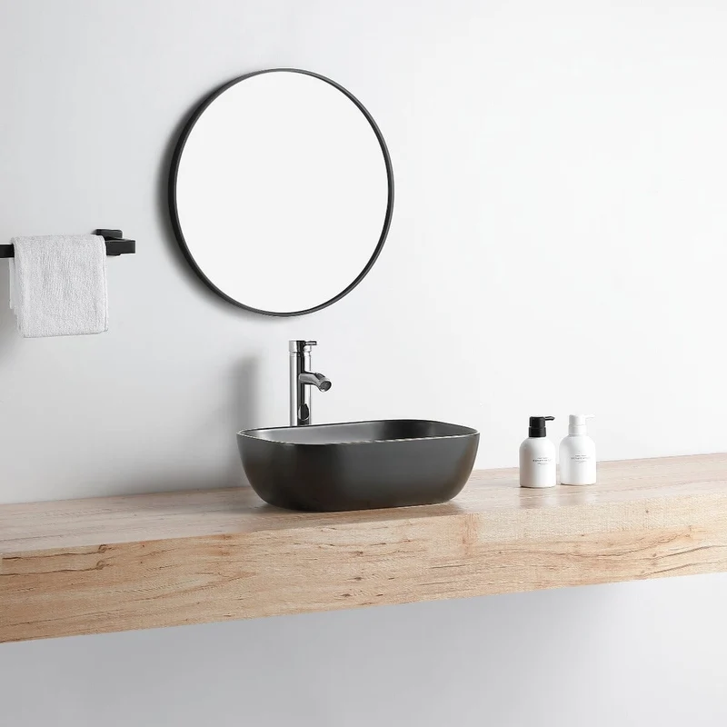 Lavabo negro mate borde dorado sobre encimera cerámico CUARTO 45,5 x 32,5 cm