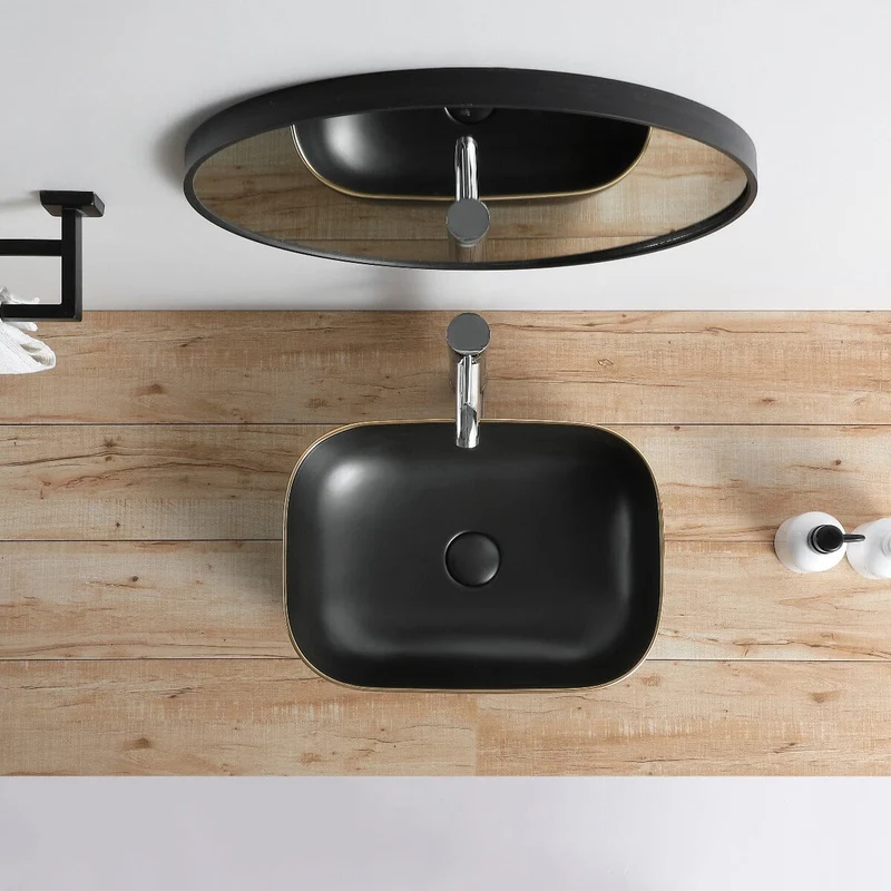 Lavabo negro mate borde dorado sobre encimera cerámico CUARTO 45,5 x 32,5 cm