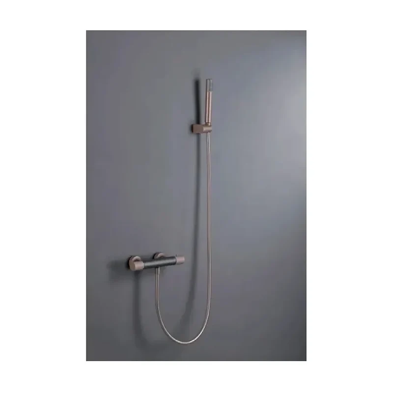 Grifo de ducha termostático fabricado en latón de acabado gris mate y champagne Line de Imex
