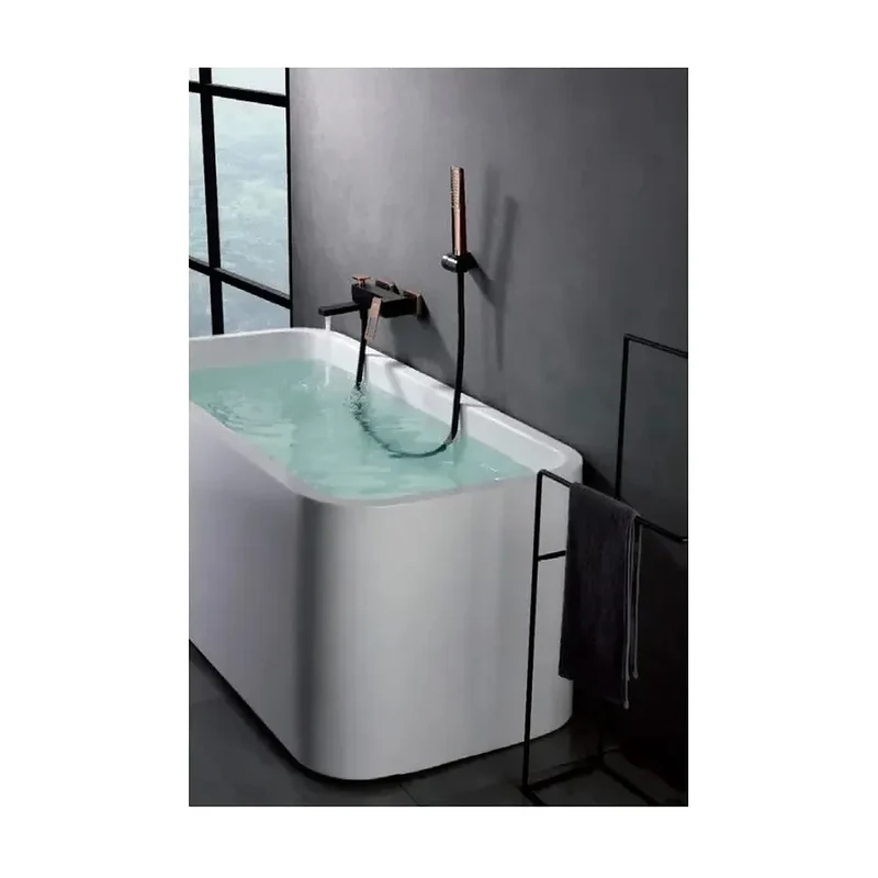 Grifo monomando de pared para bañera con un acabado negro y oro rosa Suecia de Imex