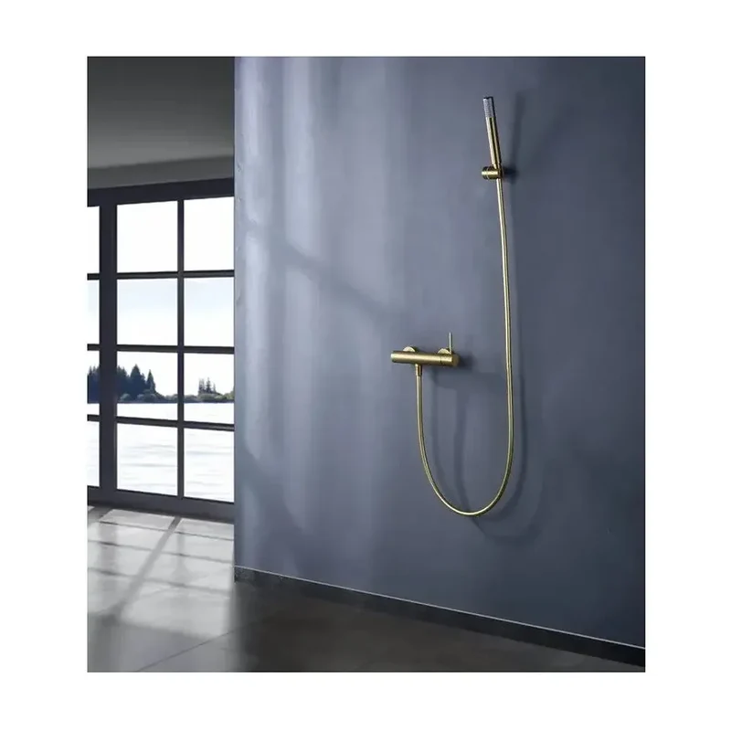 Conjunto de grifo monomando con ducha de mano fabricados en latón con acabado oro cepillado Monza de Imex