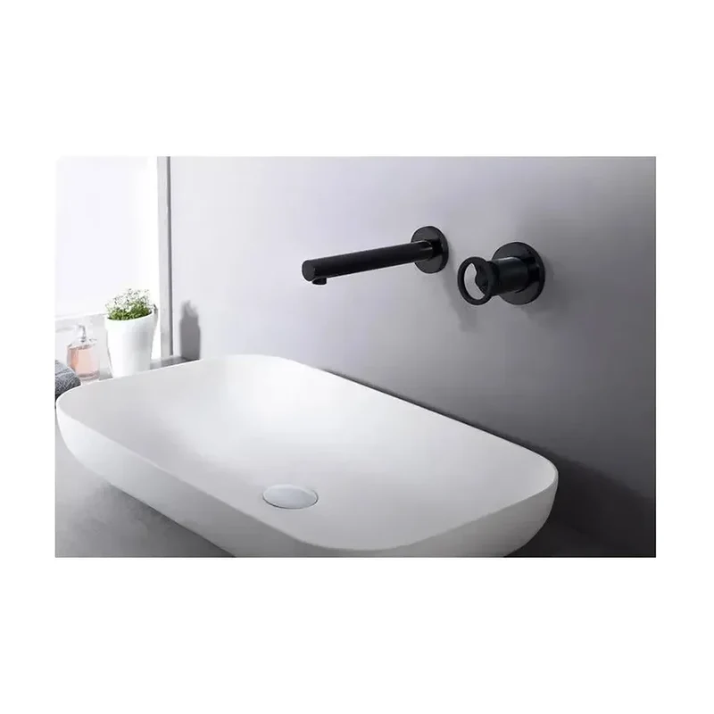 Grifo de lavabo empotrado con un diseño monomando de acabado negro mate Olimpo de Imex