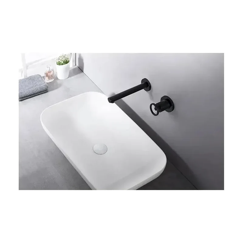 Grifo de lavabo empotrado con un diseño monomando de acabado negro mate Olimpo de Imex