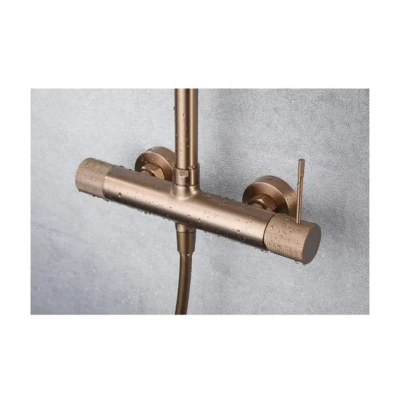 Barra de ducha monomando extensible en acero inoxidable acabado oro rosa cepillado Line de Imex
