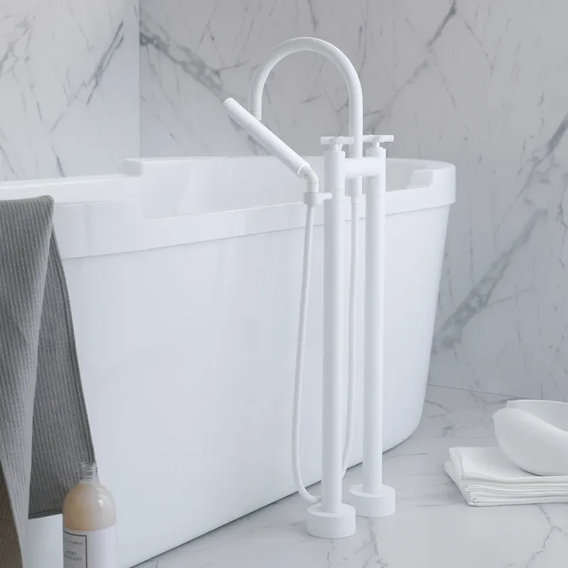 Grifo de bañera con batería de dos orificios para montaje exento con juego de ducha de mano TARA