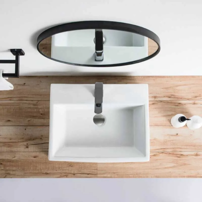 Lavabo blanco brillante sobre encimera cerámico CORRIENTES 53 x 42 cm