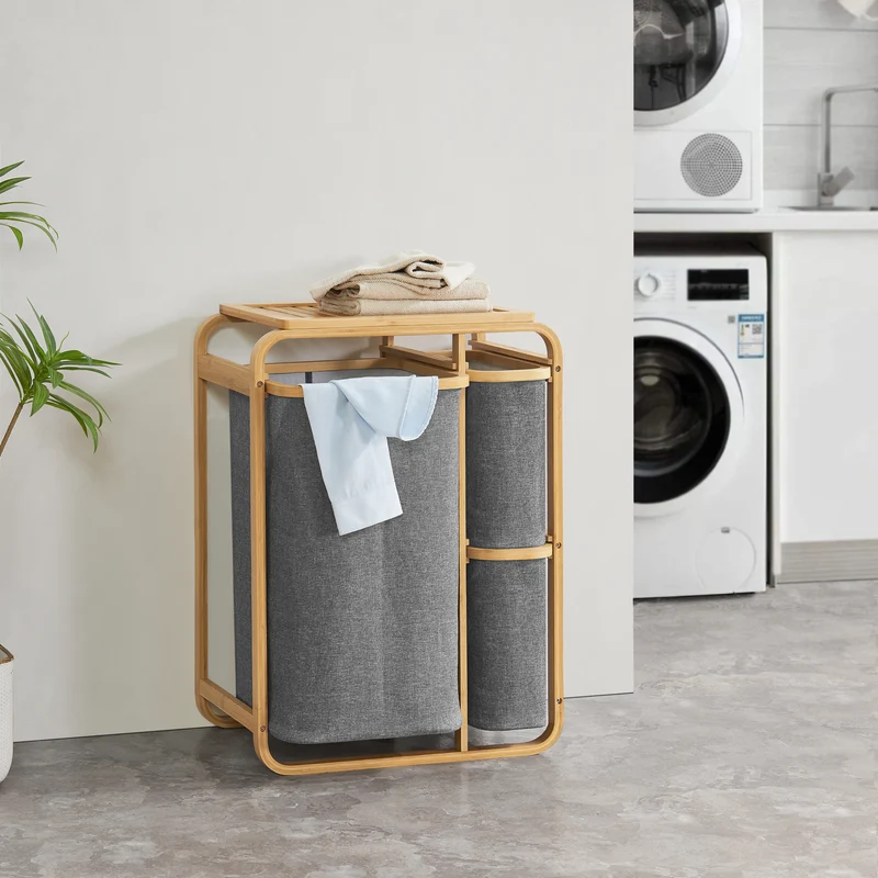 Clasificador de ropa Evenes con 3 bolsas/ 38 L + 12 L bambú/poliéster 71 x 50 x 33 cm - En diferentes colores [en.casa]