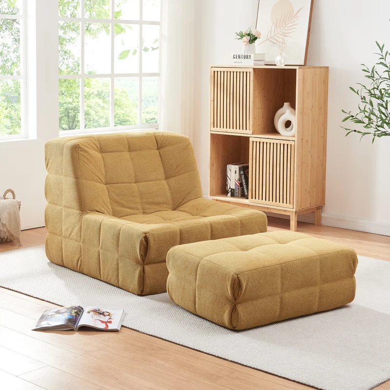 Sillón de suelo con reposapiés Koskyvn textil [en.casa]