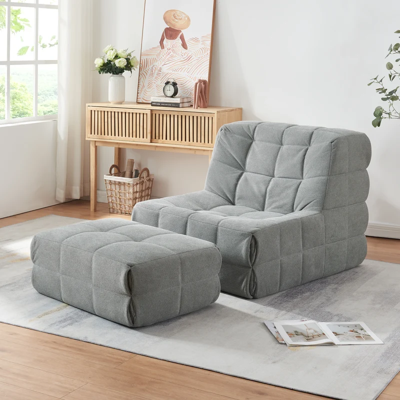 Sillón de suelo con reposapiés Koskyvn textil [en.casa]